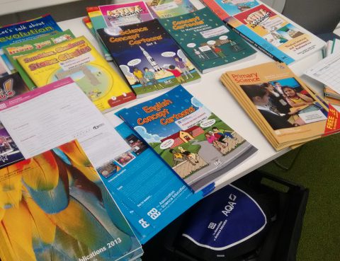 A photo of schoolbooks on a table.